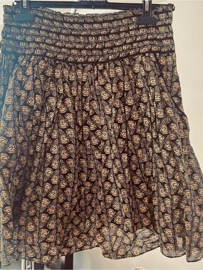 Smocked Waist Black and yellow Butterfly-Print flared Skirt with side pockets.